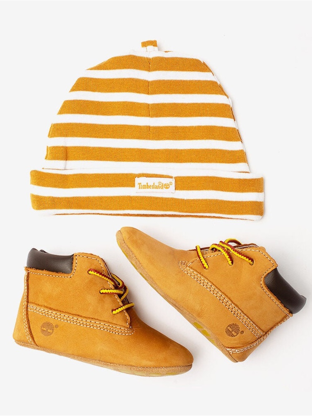 Timberland’s Infant size 3 boots and matching hat set.